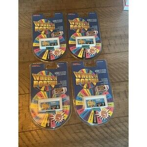 Tiger Electronics New Vintage Wheel Of Fortune Video Game Cartridges #4, 7, 8, 9